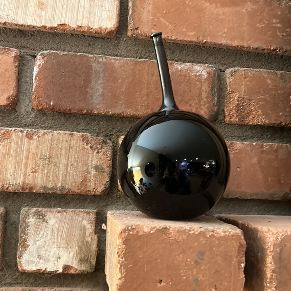 Black glass apple sculpture